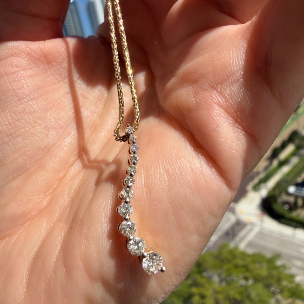 Gold Chain Necklace with Graduated White Gemstone Pendant